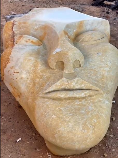 Sculptural Face Coffee Table | Abstract Stone-Finish Base, Tempered Glass Top